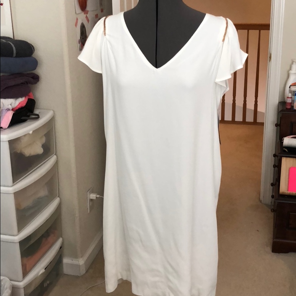 White dress with rose gold shoulder detail